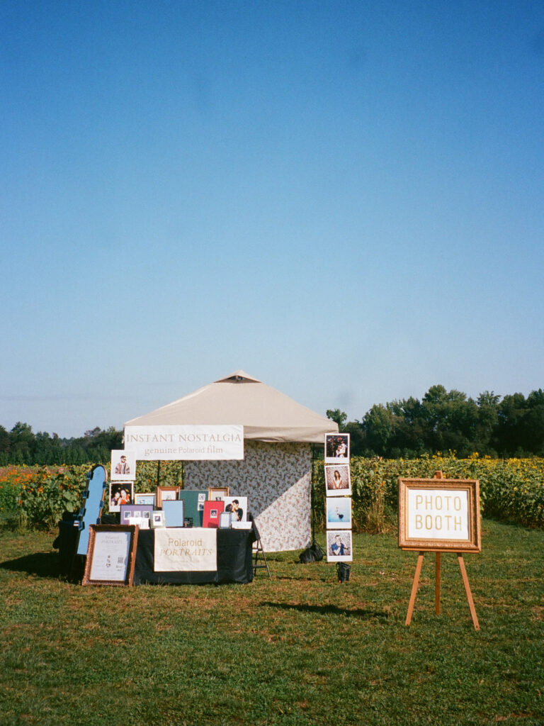 fauna & film huntsville photo booth set up in flower field at hubert family farms