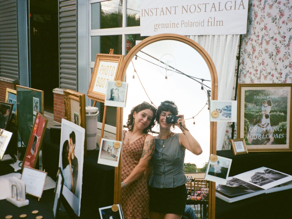 photographers in mirror at fauna & film huntsville photo booth