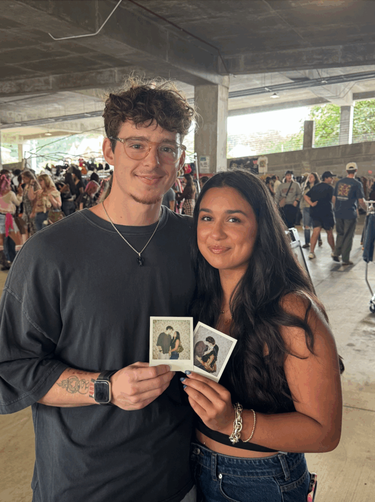 couple holds Polaroids taken at fauna & film's huntsville photo booth
