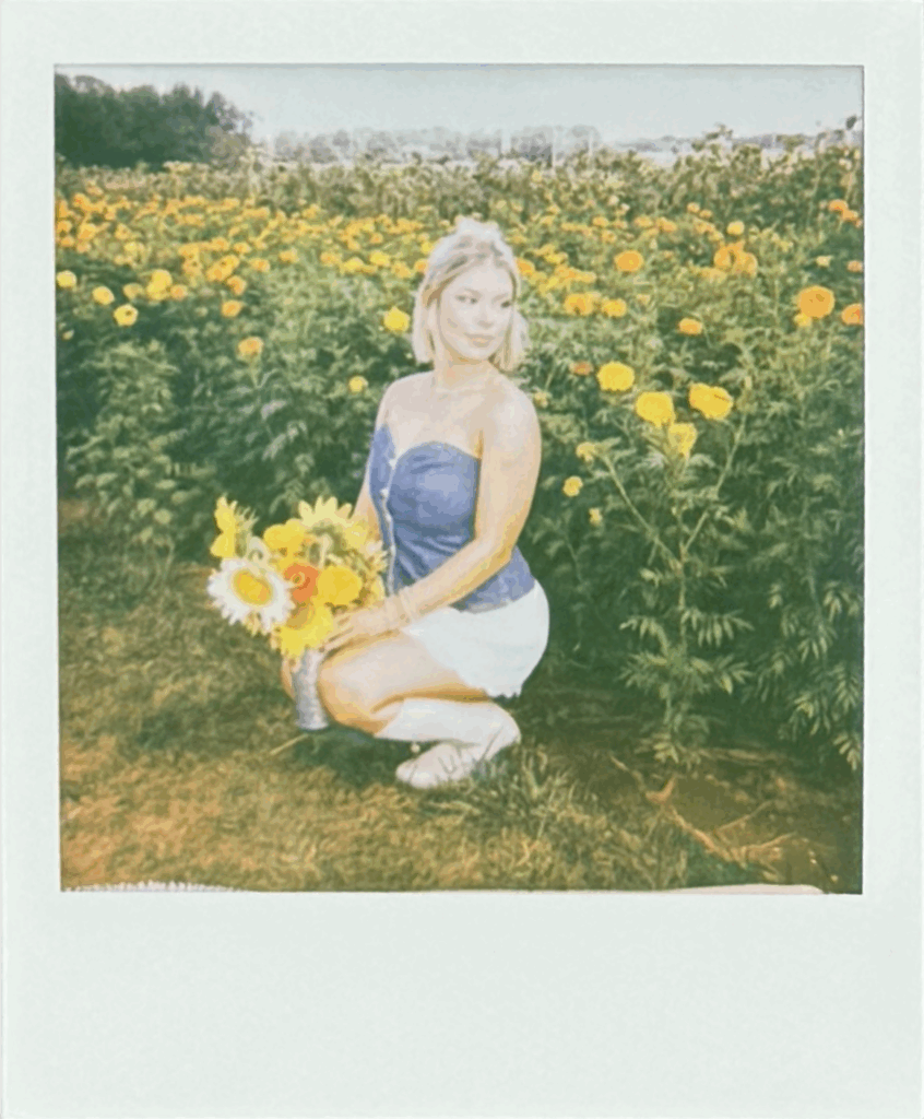 woman in flower field at Hubert Family Farms taken at huntsville photo booth