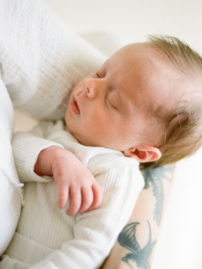 a closeup of a baby during newborn photos at home